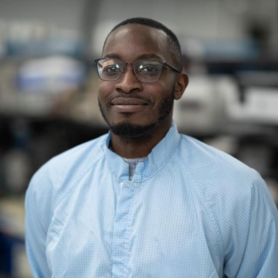 Employee poses for photo